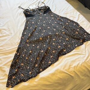 En Saison Black and Cream Asymmetrical Dress